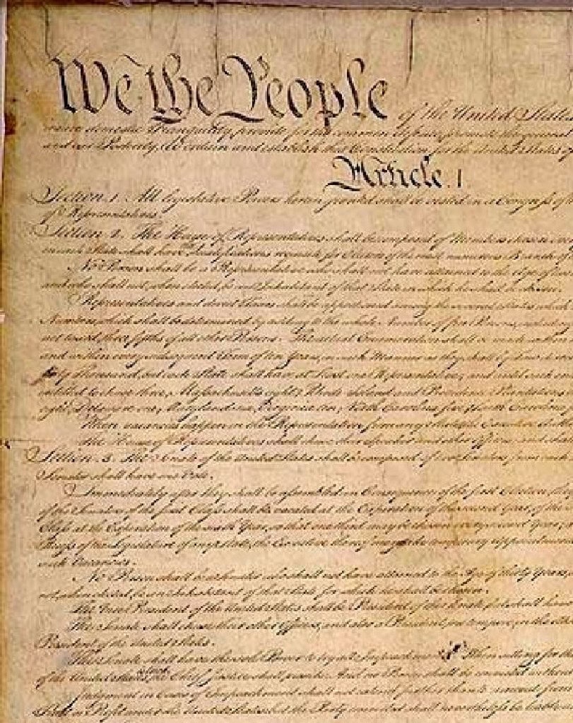 A close-up of the original handwritten United States Constitution, perfect for Constitutional Amendments Exam preparation.