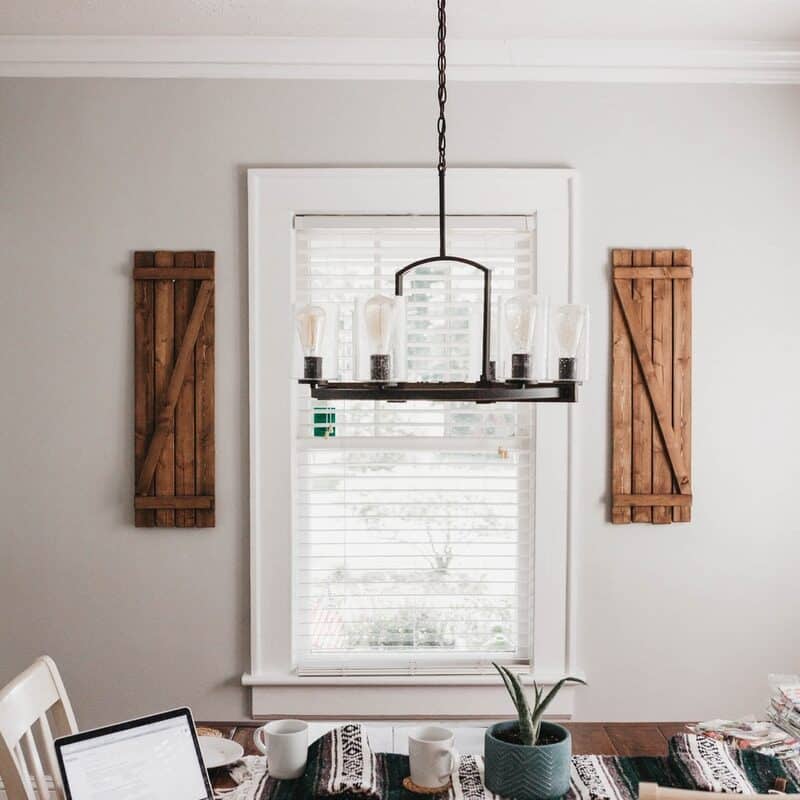 gray and black laptop computer on brown wooden table